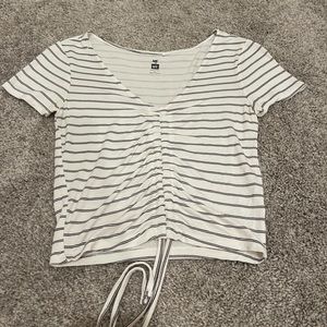 White top with horizontal black stripes